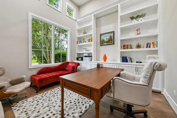 a living room with furniture and a window