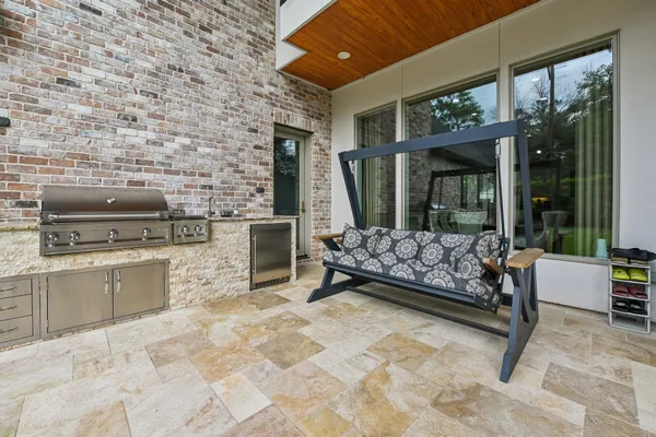a living room with furniture rug and a fireplace
