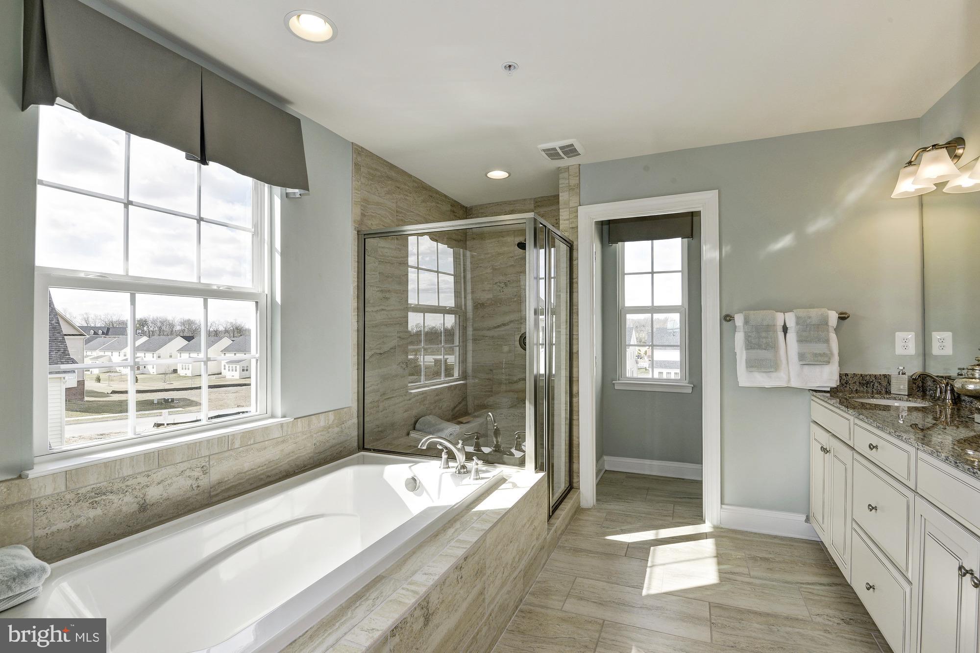 14402 Claggett Run Road Brandywine, MD 20613 - Photo 15 of 23 OWNER'S TUB W/GRANITE COUNTER-TOPS