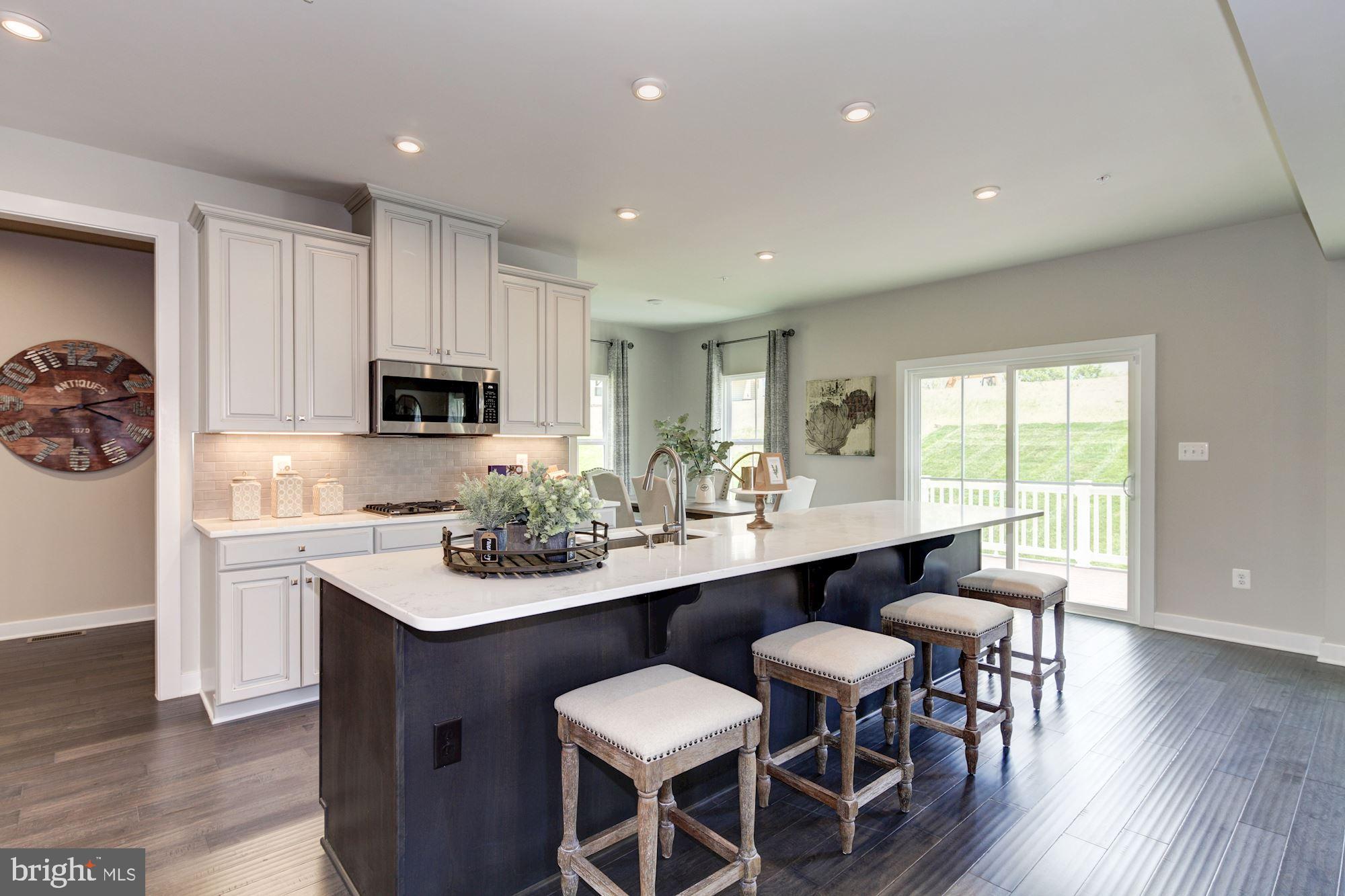14402 Claggett Run Road Brandywine, MD 20613 - Photo 8 of 23 KITCHEN ISLAND W/GRANITE COUNTERTOP