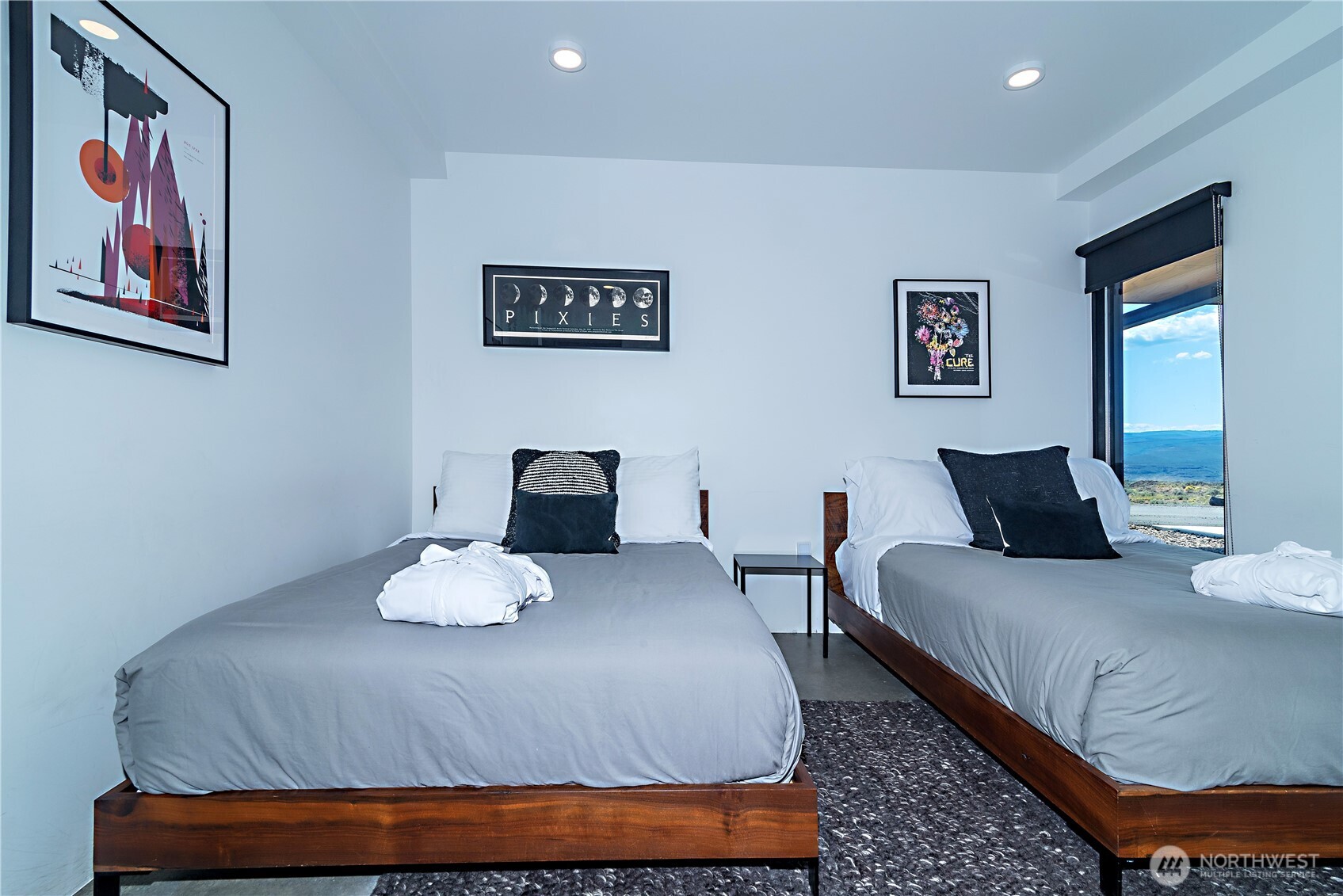 23592 Gorge View Loop Northwest Quincy, WA 98848 - Photo 19 of 24 a bedroom with a bed and wooden floor