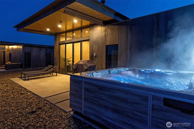 a room with wooden cabinets and dining area