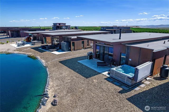 a view of a swimming pool with seating area