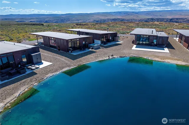 a view of a swimming pool with an ocean view