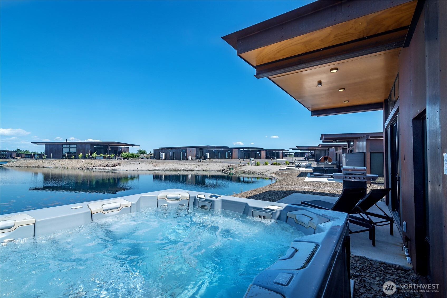 23592 Gorge View Loop Northwest Quincy, WA 98848 - Photo 7 of 24 a view of swimming pool with outdoor seating and yard