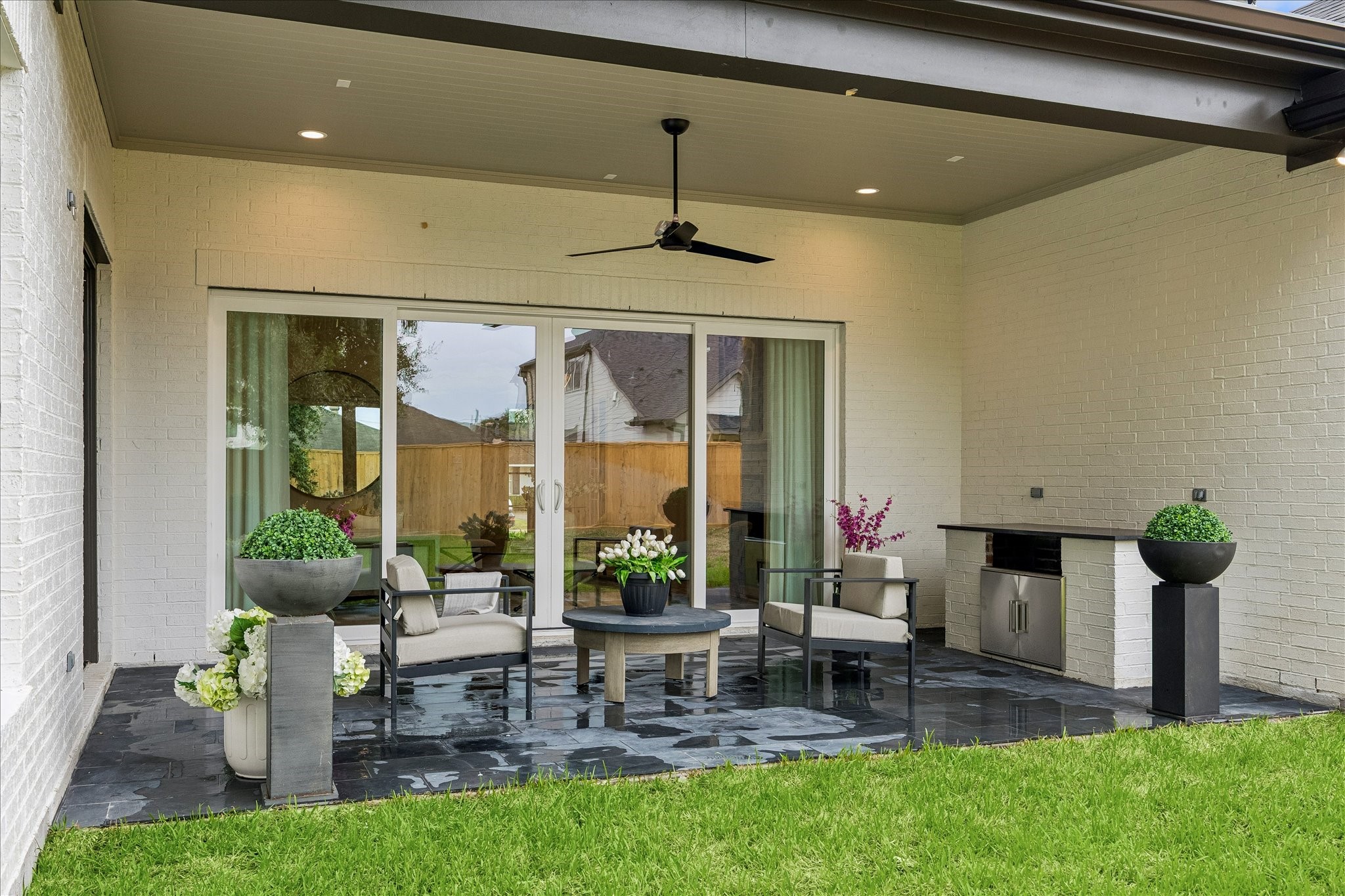 1618 Ronson Road Houston, TX 77055 - Photo 40 of 43 Covered outdoor living with built-in Coyote gas grill