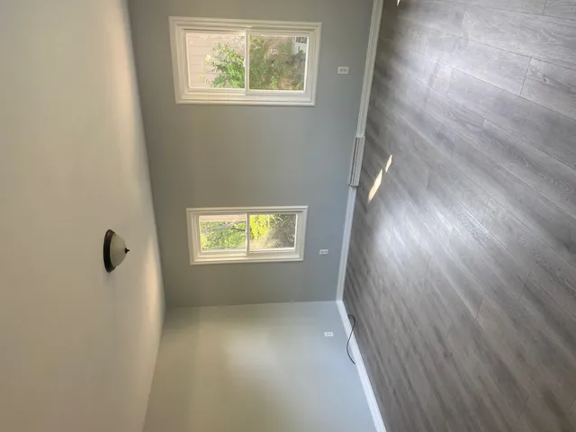 an empty room with windows