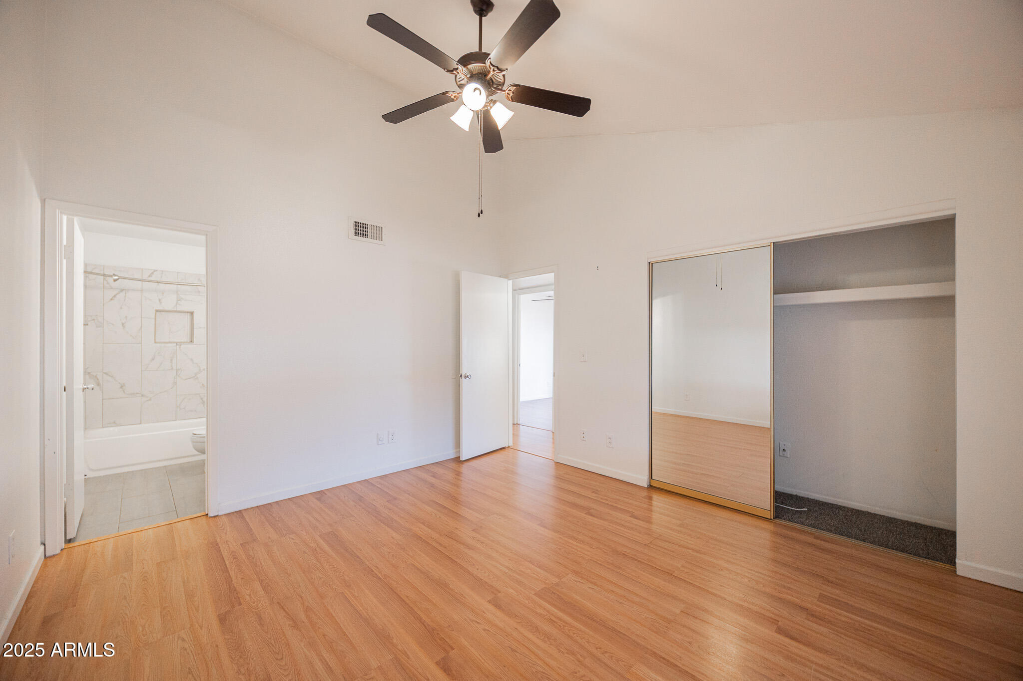 2141 East Kirkland Lane, Unit 4 Tempe, AZ 85281 - Photo 11 of 21 a view of empty room with wooden floor