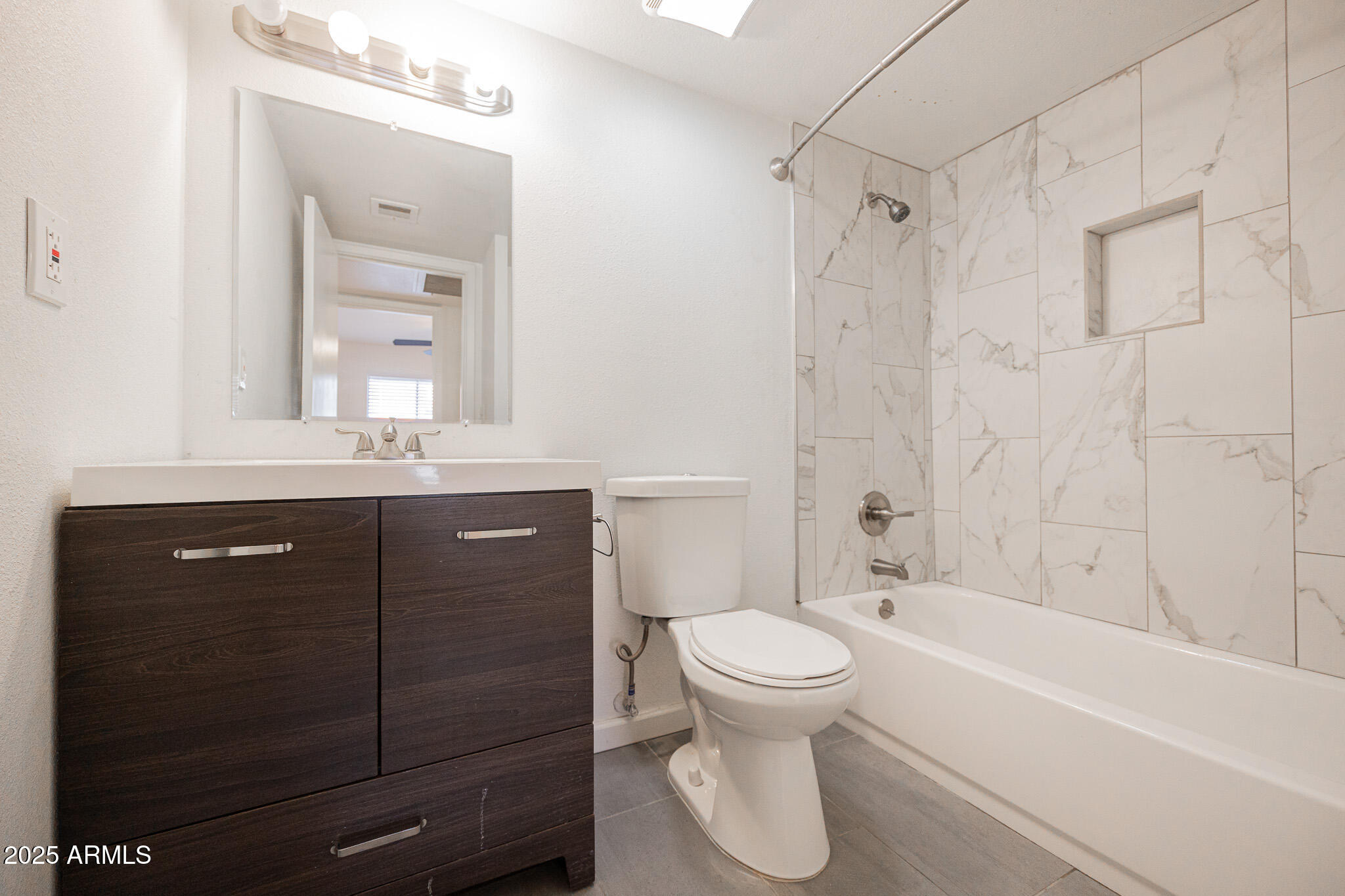 2141 East Kirkland Lane, Unit 4 Tempe, AZ 85281 - Photo 15 of 21 a bathroom with a sink a toilet and shower