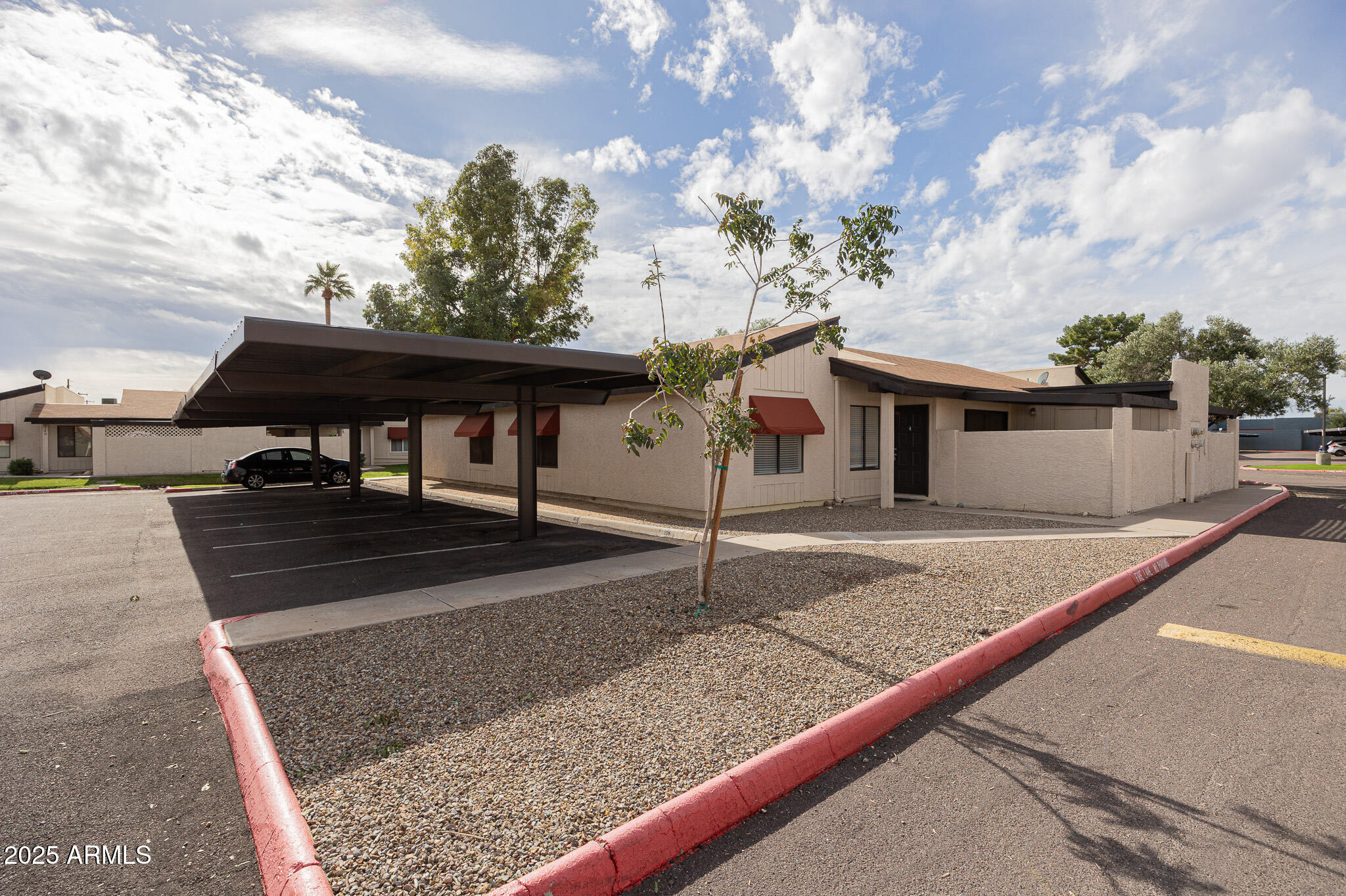 2141 East Kirkland Lane, Unit 4 Tempe, AZ 85281 - Photo 3 of 21 a view of a house with backyard