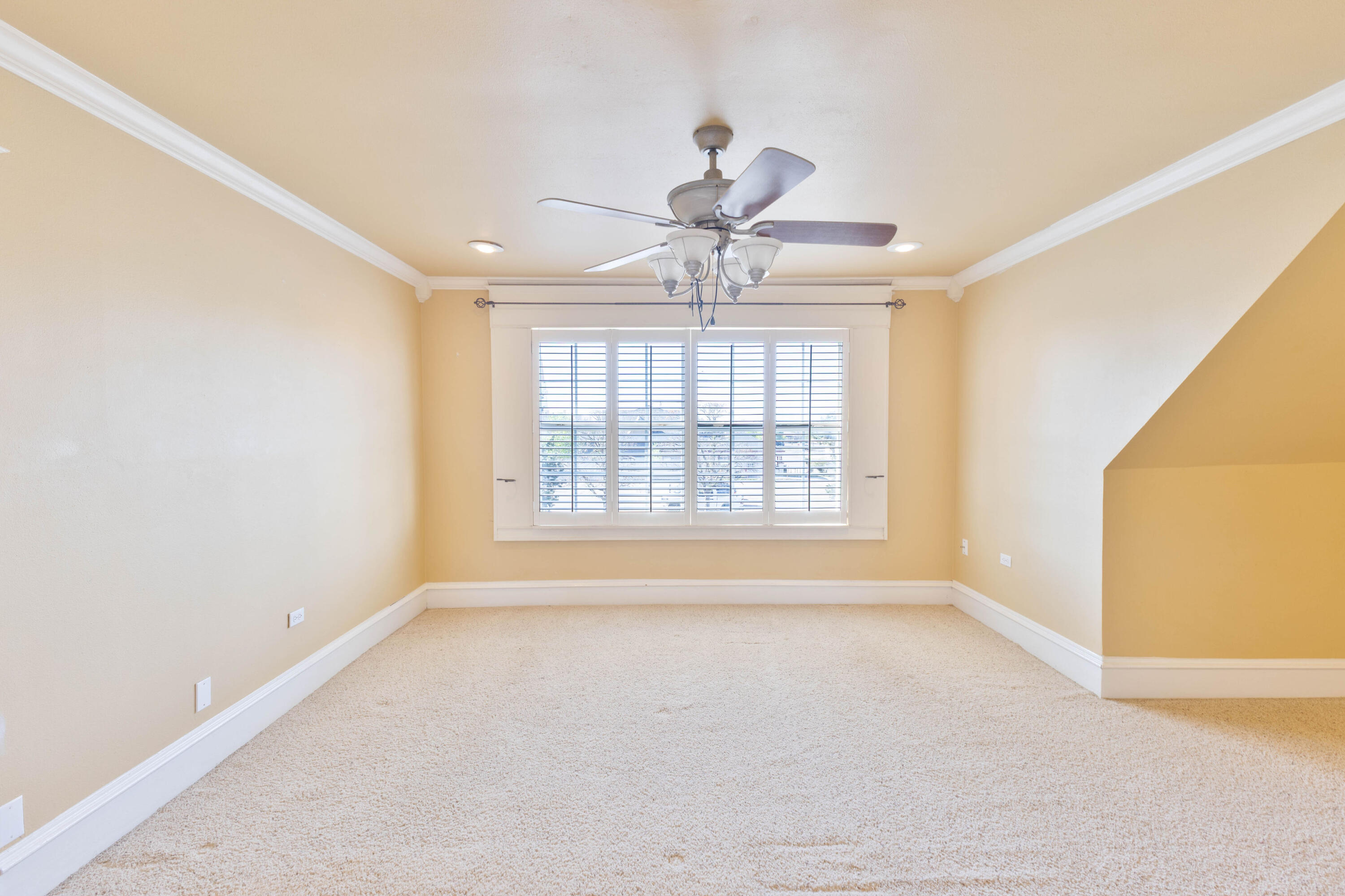 212 West 9th Street Plainview, TX 79072 - Photo 22 of 35 a view of an empty room with a window