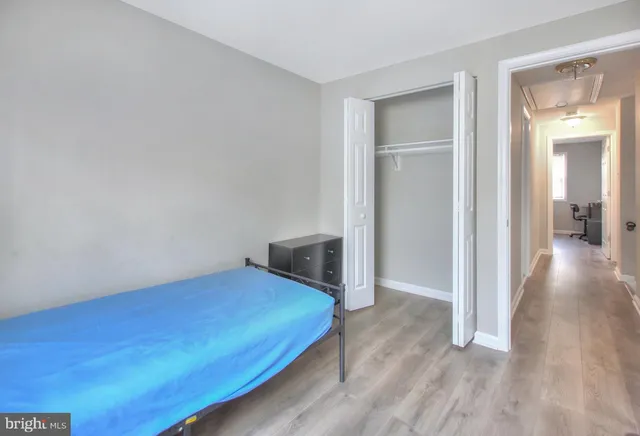 a view of a livingroom with wooden floor