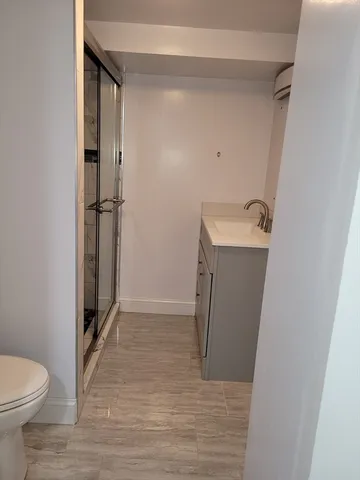 a bathroom with a sink and a toilet