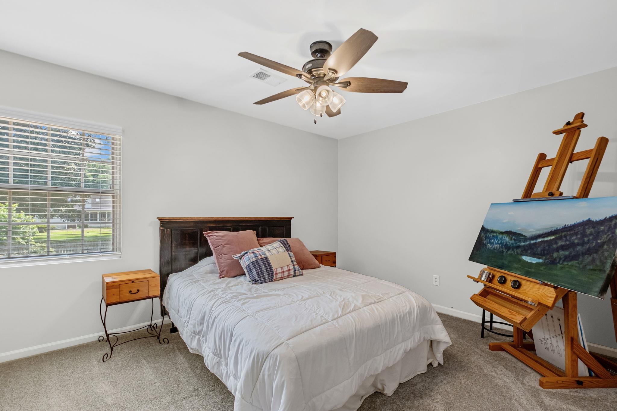 4729 Cedar Ridge Drive Millington, TN 38053 - Photo 30 of 40 Neutral wall paint with textured carpeting, a ceiling fan with light fixture, and a window featuring horizontal blinds