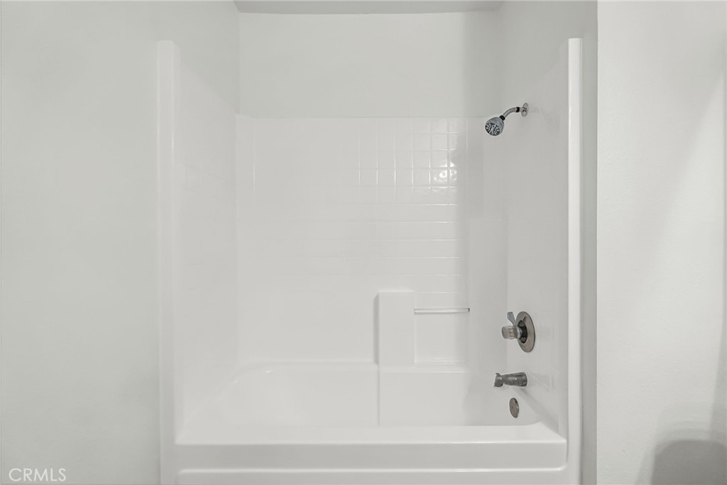 375 Central Avenue, Unit 83 Riverside, CA 92507 - Photo 15 of 29 a bathroom with a bathtub