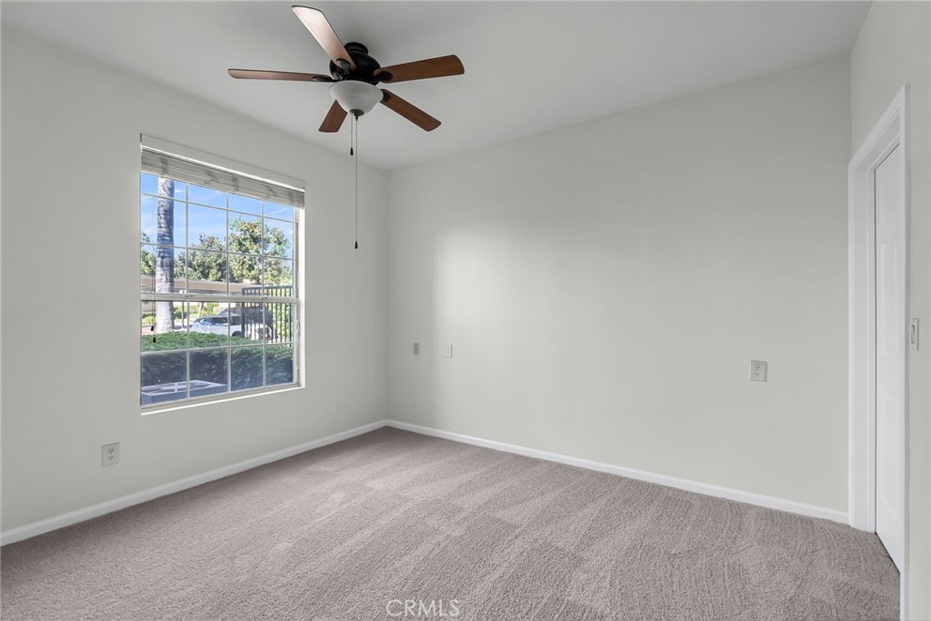 375 Central Avenue, Unit 83 Riverside, CA 92507 - Photo 16 of 29 an empty room with a window
