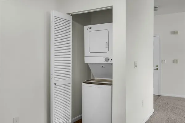 a view of room with a hallway