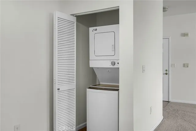 a view of room with a hallway