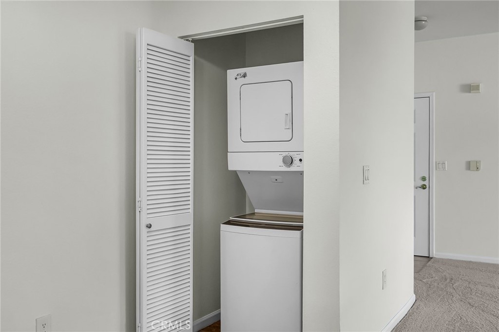 375 Central Avenue, Unit 83 Riverside, CA 92507 - Photo 18 of 29 a view of room with a hallway