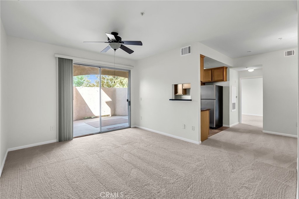 375 Central Avenue, Unit 83 Riverside, CA 92507 - Photo 2 of 29 a view of a kitchen with a sink and a window