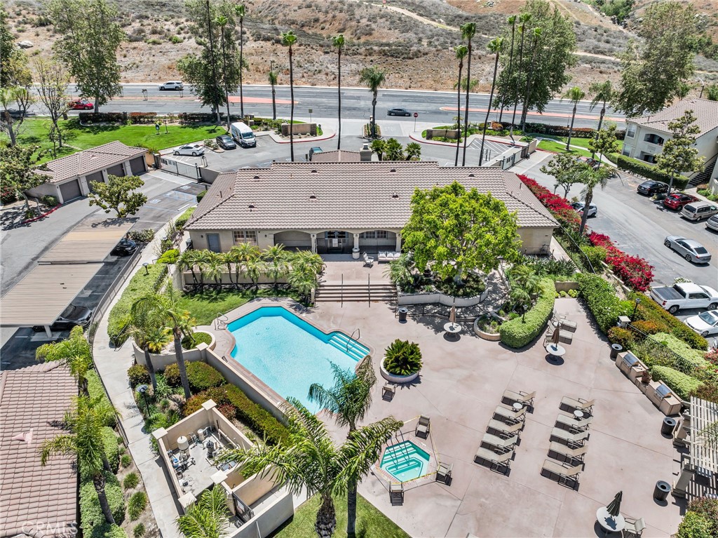 375 Central Avenue, Unit 83 Riverside, CA 92507 - Photo 21 of 29 an aerial view of a house with a yard and lake view