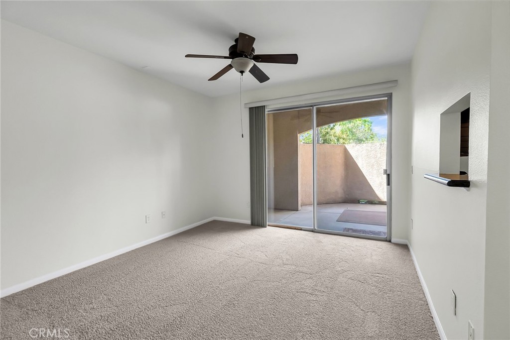 375 Central Avenue, Unit 83 Riverside, CA 92507 - Photo 8 of 29 an empty room with a window