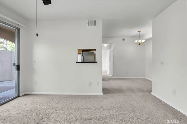 a view of a hallway with closet area
