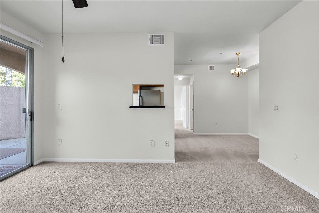 375 Central Avenue, Unit 83 Riverside, CA 92507 - Photo 10 of 29 a view of a hallway with closet area