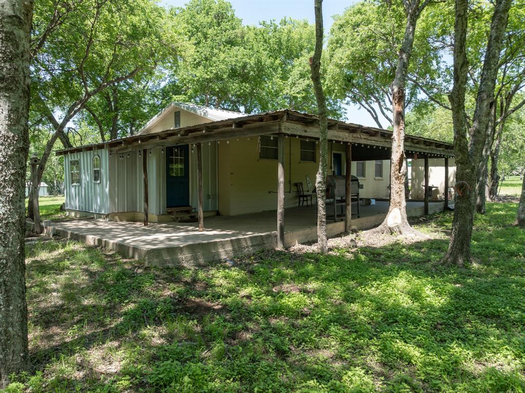 1355 North Houston Street Lorena, TX 76655 - Photo 11 of 40 a view of a house with backyard and garden