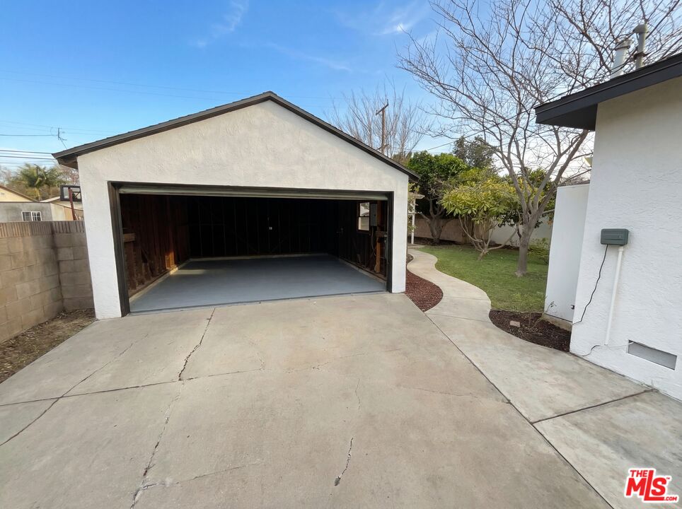 3237 Daisy Avenue Long Beach, CA 90806 - Photo 11 of 28 a front view of house with yard and garage