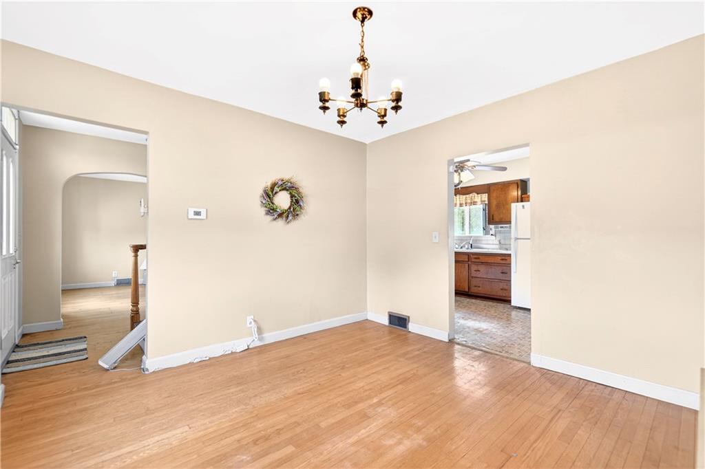 607 Cemetery Road Perryopolis, PA 15473 - Photo 6 of 30 a view of an empty room with a window