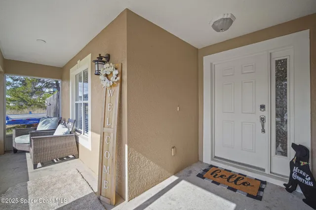 a room with furniture and a gate