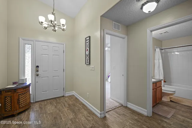 a view of a livingroom with a chandelier