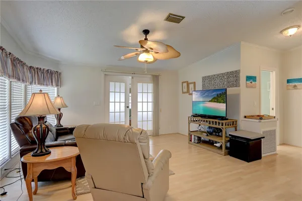 a kitchen with a sink cabinets and appliances