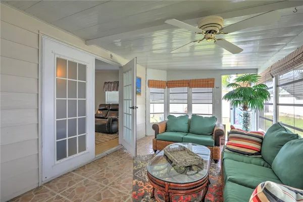 a view of street with houses and trees in the background