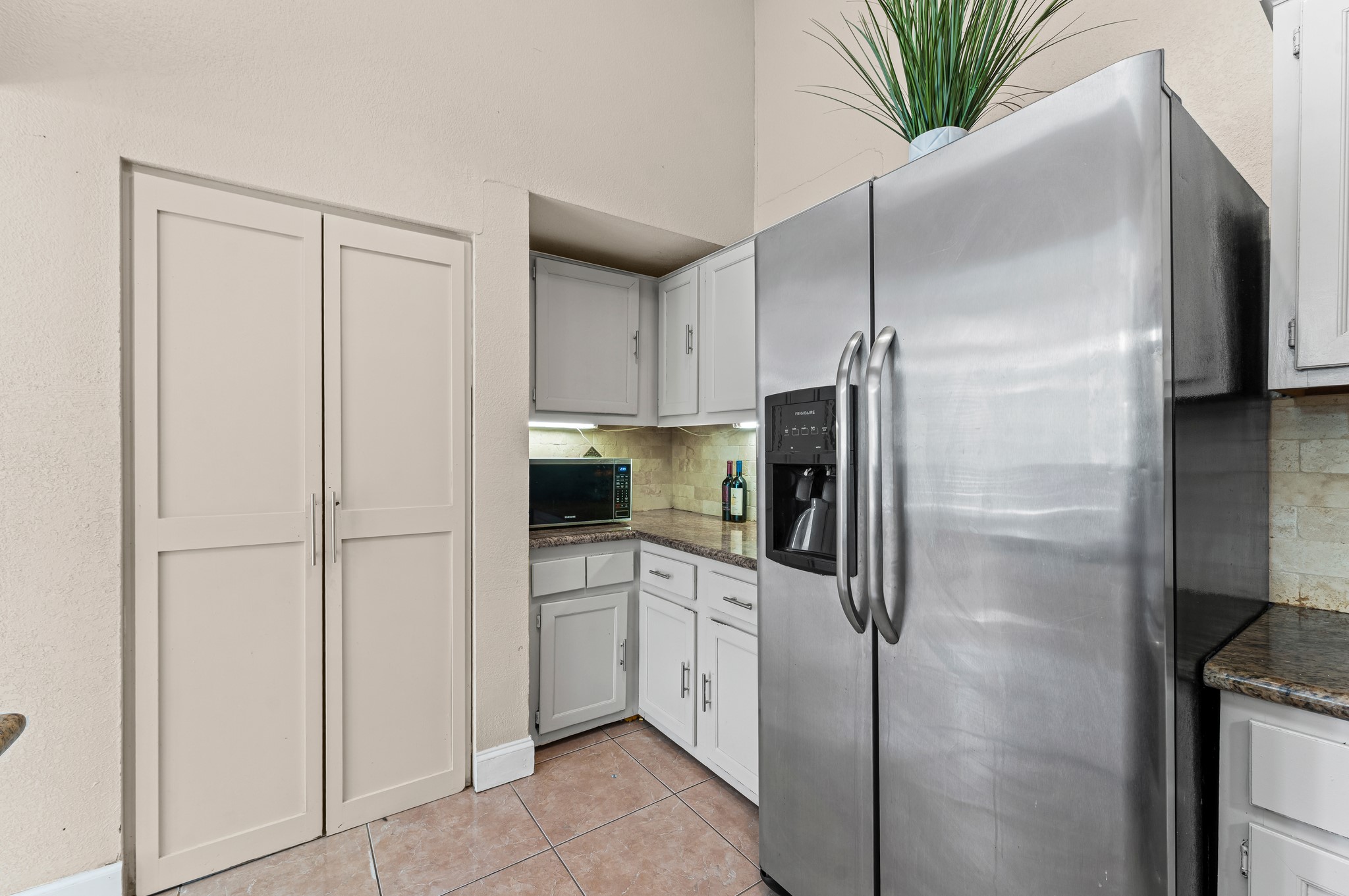 1034 Little Port Channelview, TX 77530 - Photo 13 of 21 a kitchen with a refrigerator and a sink