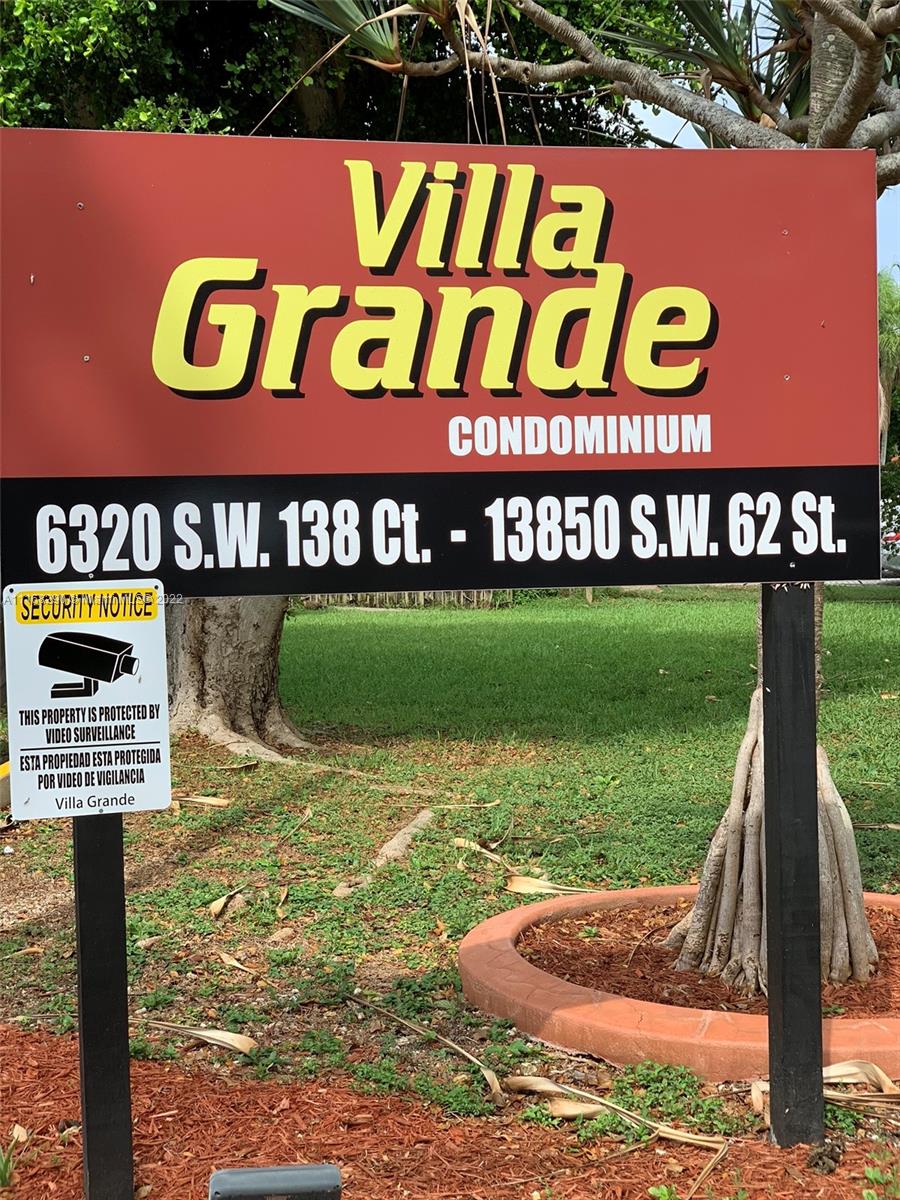 6320 Southwest 138th Court, Unit 308 Miami, FL 33183 - Photo 18 of 25 a view of outdoor space with sign board