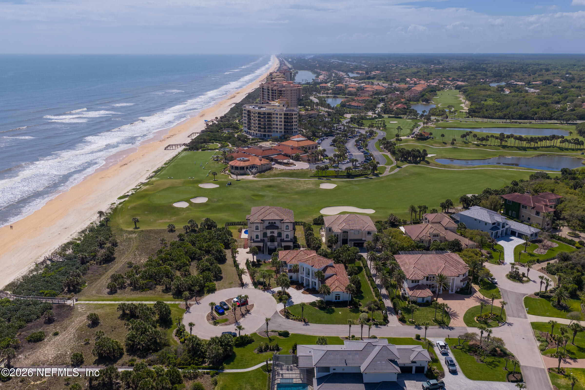 6 Riviera Place Palm Coast, FL 32137 - Photo 109 of 132 a view of a city with lots of residential buildings ocean and mountain view in back