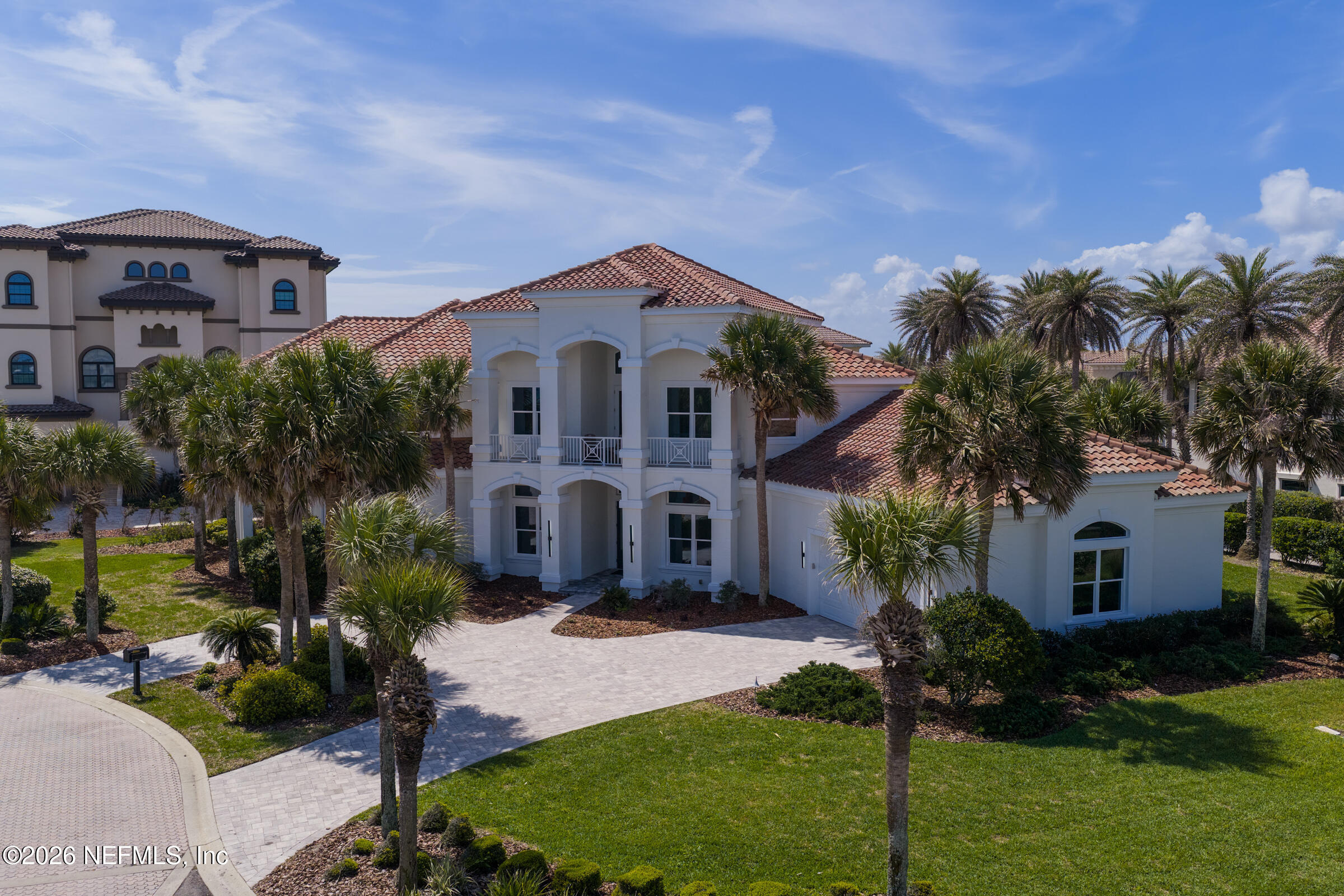 6 Riviera Place Palm Coast, FL 32137 - Photo 115 of 132 a front view of a house with a yard and garage