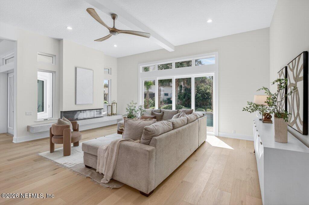 6 Riviera Place Palm Coast, FL 32137 - Photo 26 of 132 a living room with furniture and a large window
