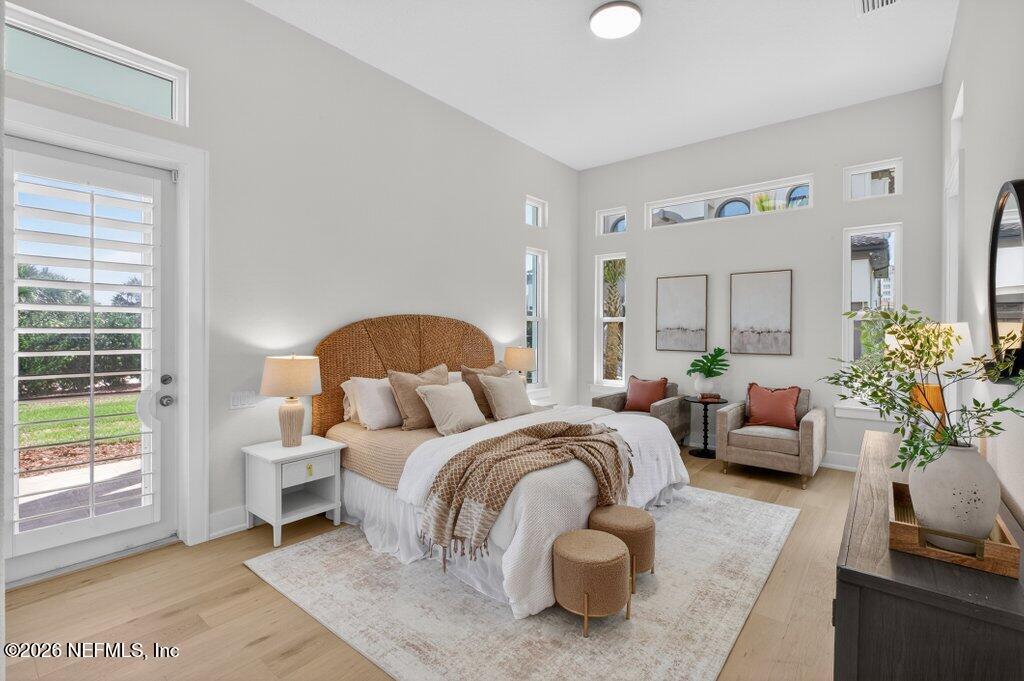 6 Riviera Place Palm Coast, FL 32137 - Photo 29 of 132 a bedroom with bed and a couch