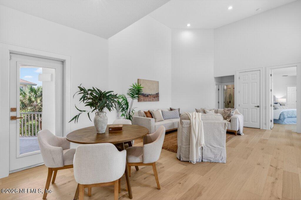 6 Riviera Place Palm Coast, FL 32137 - Photo 52 of 132 a view of a dining room with furniture and wooden floor