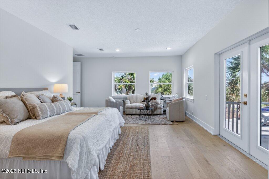 6 Riviera Place Palm Coast, FL 32137 - Photo 71 of 132 a bed room with two beds and a large window