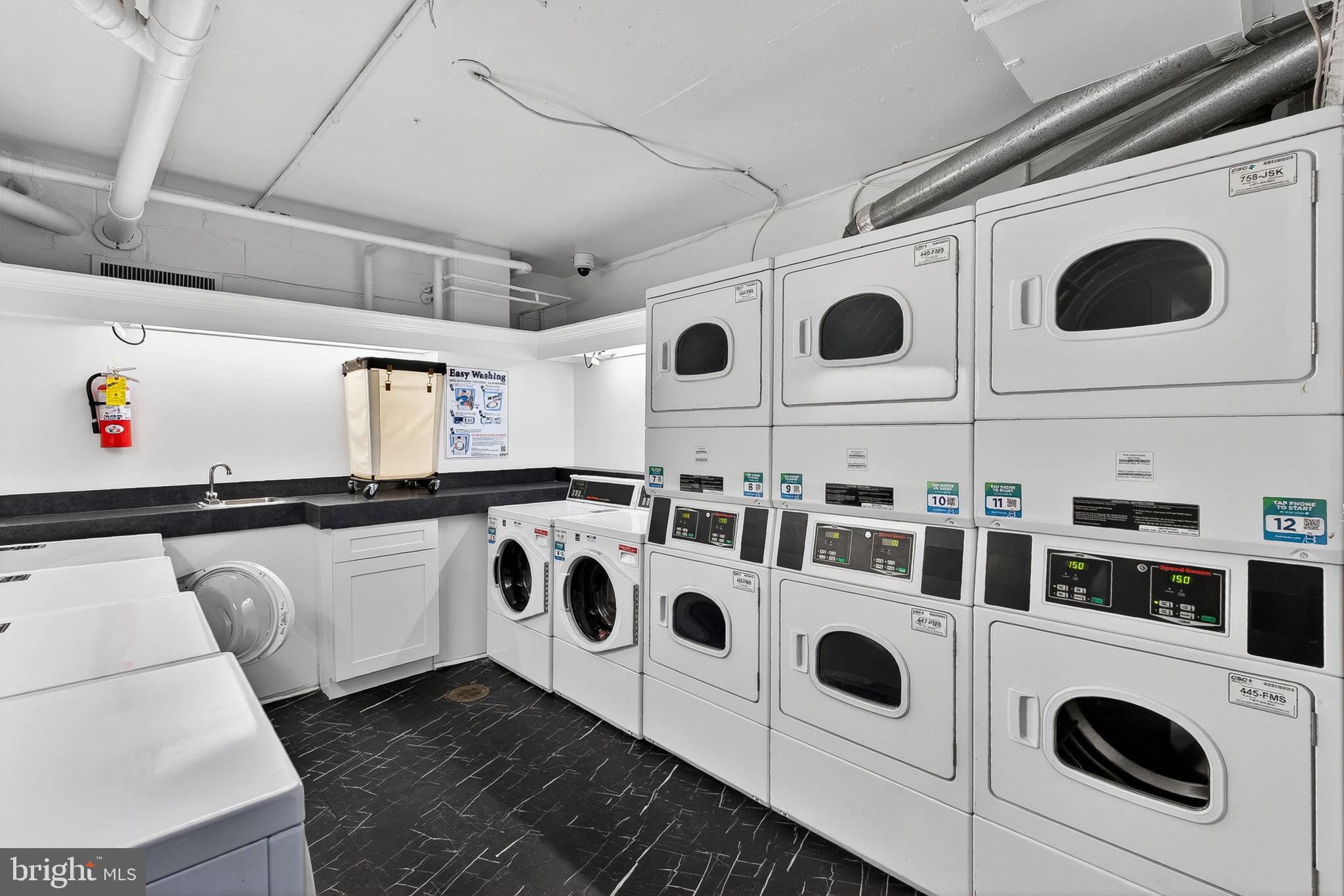 2030 F Street Northwest, Unit 606 Washington, DC 20006 - Photo 20 of 29 Clean laundry with multiple machines