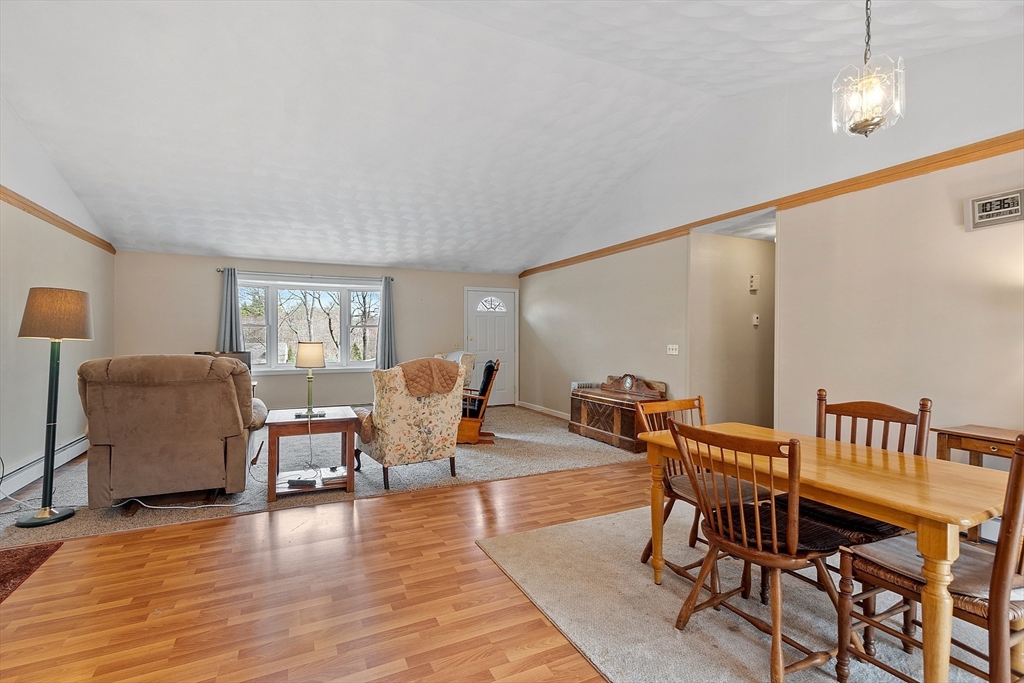717 Old Petersham Road Barre, MA 01005 - Photo 11 of 40 a living room with furniture and wooden floor