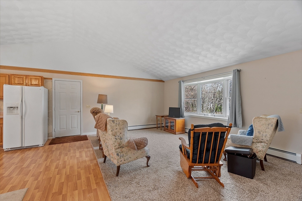 717 Old Petersham Road Barre, MA 01005 - Photo 12 of 40 a living room with furniture and a window