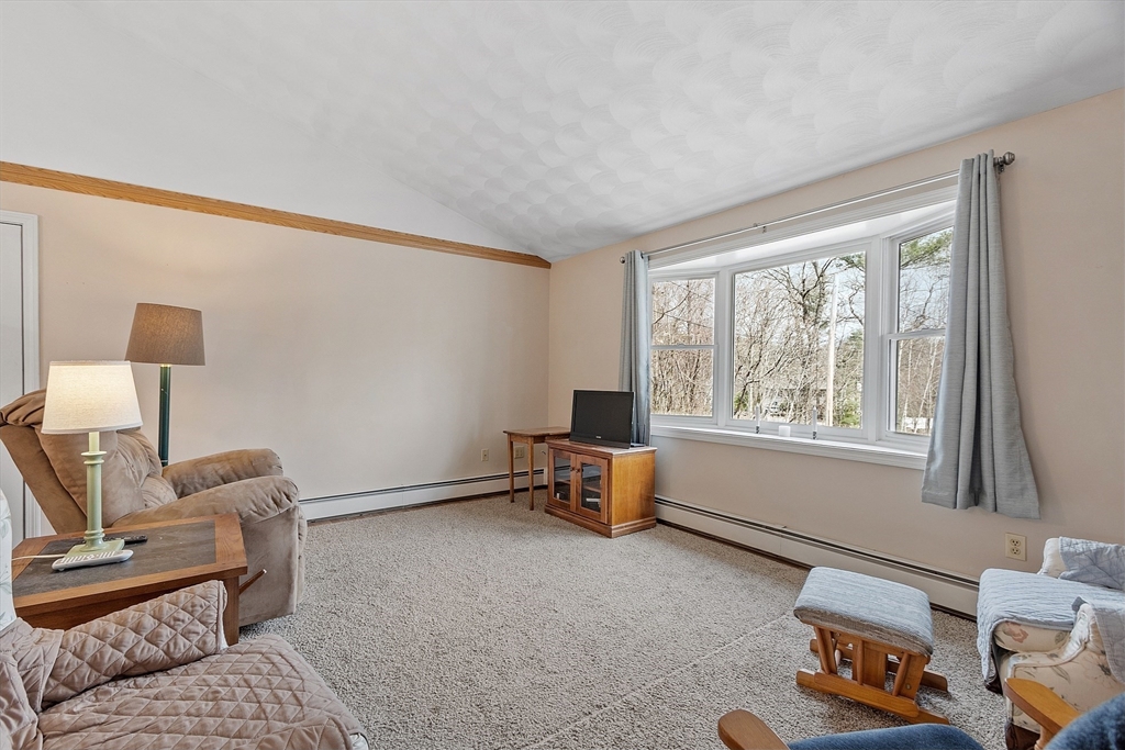 717 Old Petersham Road Barre, MA 01005 - Photo 14 of 40 a living room with furniture and a window