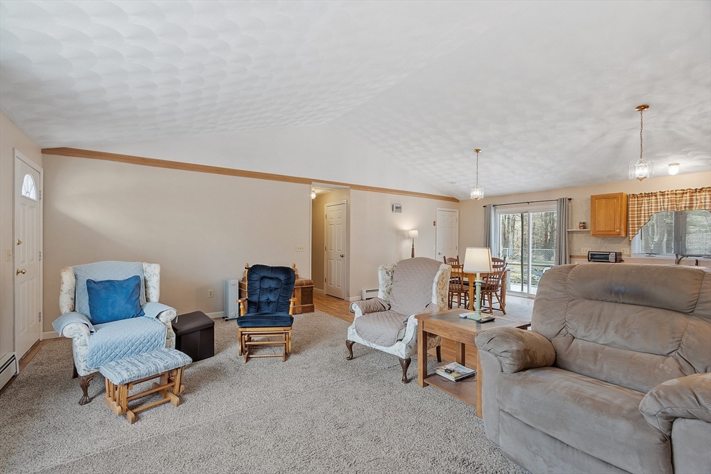 717 Old Petersham Road Barre, MA 01005 - Photo 15 of 40 a living room with furniture and a couch