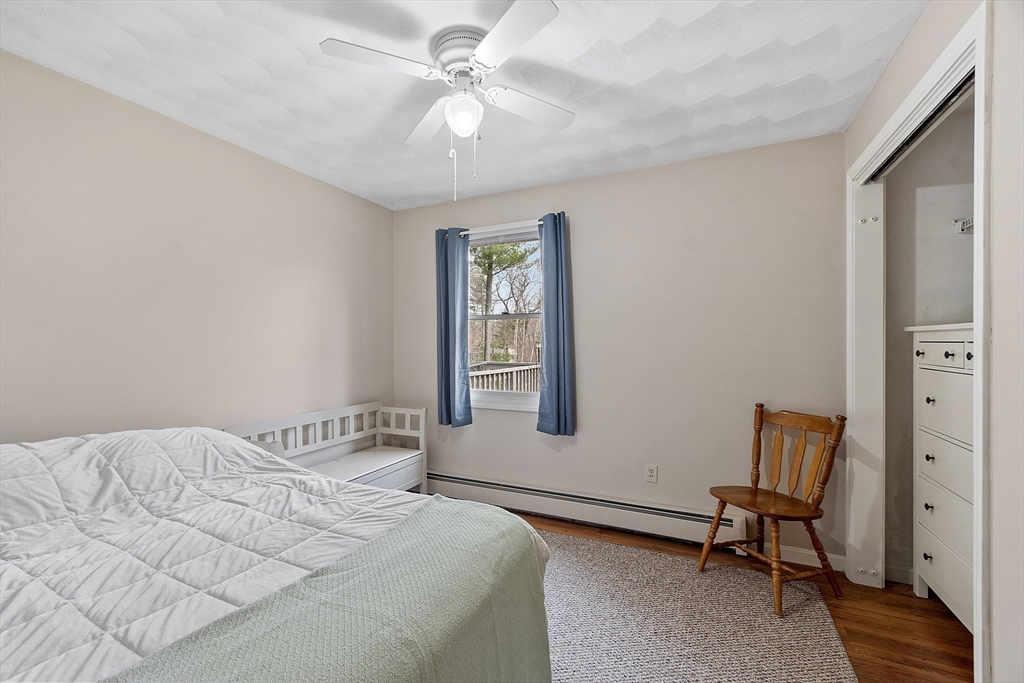 717 Old Petersham Road Barre, MA 01005 - Photo 16 of 40 a bedroom with a bed and a window