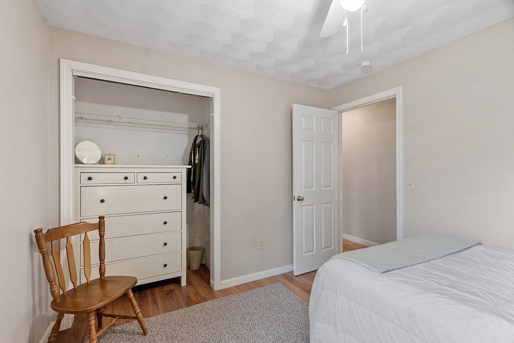 717 Old Petersham Road Barre, MA 01005 - Photo 18 of 40 a bedroom with a bed and a dresser